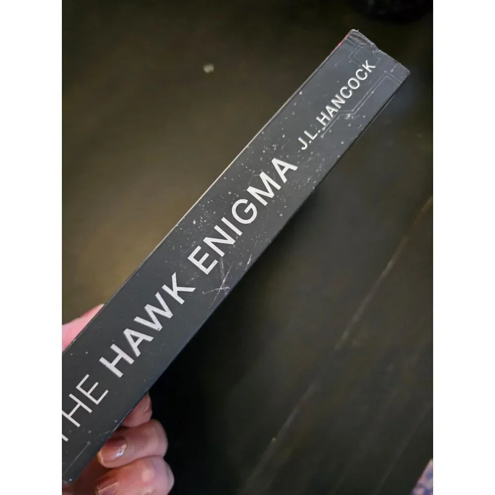 Hawk Enigma by J.L. Hancock Paperback Book